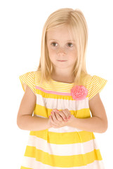 Obraz premium beautiful Young blonde girl with hands folded in yellow shirt