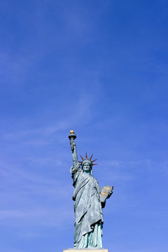 Statue of Liberty in Paris with a clear blue sky