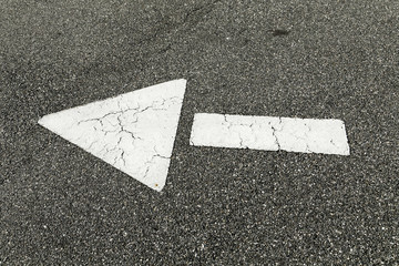 arrow at the black street