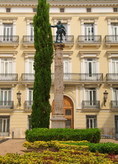Monument on one of  historic streets of Valencia
