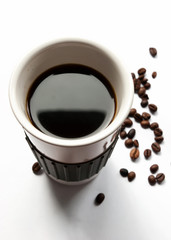 Coffee cup and beans