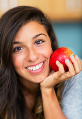 Beautiful woman with an apple