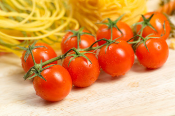 close-up of cherry tomatoes and pasta