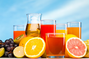 glasses of juice, fruits