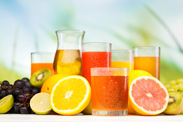 glasses of juice, fruits