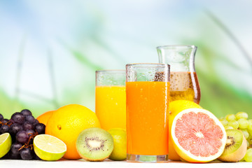 glasses of juice, fruits