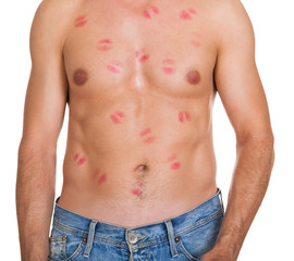 Naklejka premium Shirtless man with lipstick marks