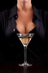 Barmaid mixing drink