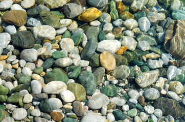 closeup clean stones in river