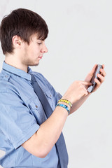 Young businessman calling by phone