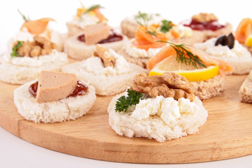 assortment of canape on board
