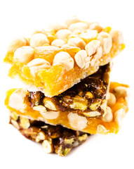 Healthy nut bar isolated on white background. Fitness style life