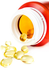 Cod liver oil omega 3 vitamin D gel capsules isolated on white b