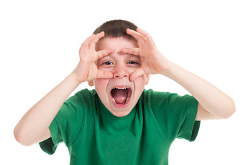 boy looks through his hands like binoculars