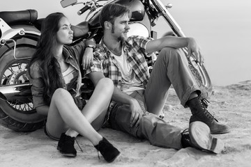 Fototapeta premium Happy young love couple on scooter enjoying themselves on trip