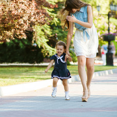 Two sisters having fun at the park