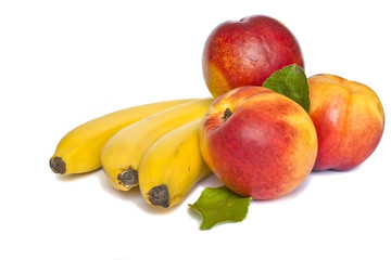 peaches and bananas isolated on white background