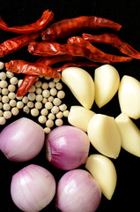 Cut garlic, shallot, white pepper and dried chili.