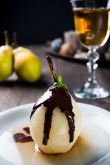 Delicious pear dessert with chocolate and amaretto liqueur - 55897891