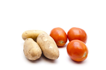 Braune Kartoffeln mit Tomaten
