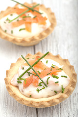 Tasty snacks with smoked salmon