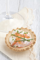 Tasty snacks with smoked salmon