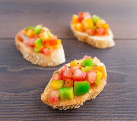 Delicious bruschetta with paprika and herbs