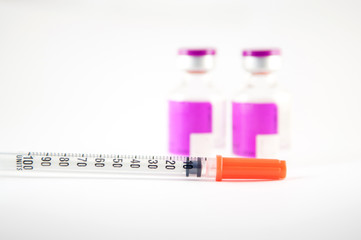 Disposable syringe and purple label injection vial
