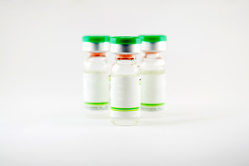 Arrange of green cap injection vials