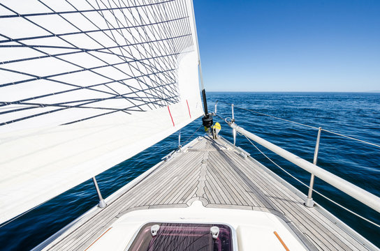 The Bow Of A Sailboat At Sea