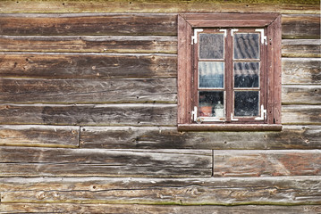 Old wooden wall with window