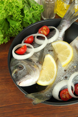 Dorado fish on table close-up