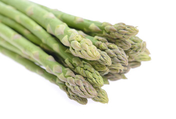 Fresh asparagus on white