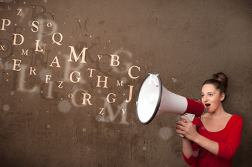Young girl shouting into megaphone and text come out