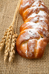 fresh buns and bread on burlap