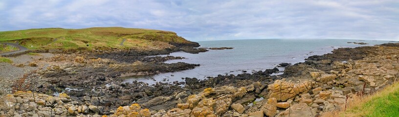 Panoramic view with Northern Ireland coastline and sea.