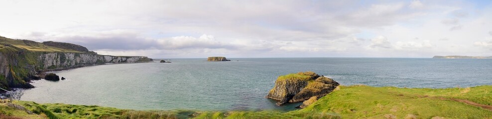 Panoramic view with Northern Ireland coastline and sea.