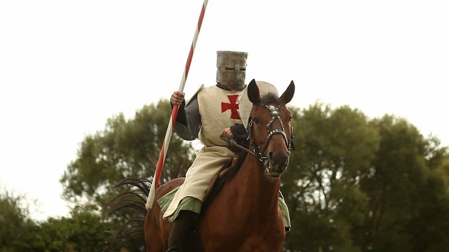 Medieval knight on horseback.