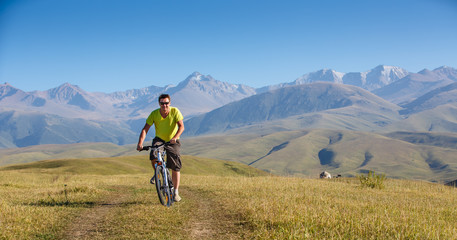 Obraz premium male riding a mountain bike