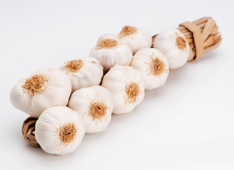 heads of garlic tied in a row