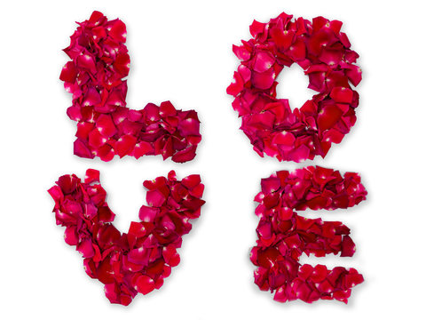 Word of love made from red rose petals isolated on white
