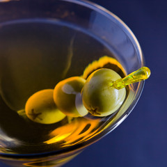 martini with green olives © Igor Normann