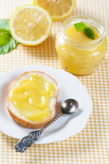 Homemade lemon curd with fresh lemons