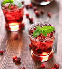 cranberry cocktail with mint garnish.