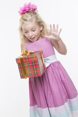 Girl can't wait to open a gift