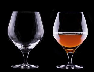 Cognac or brandy on a black