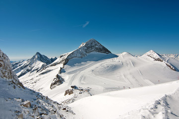 Winter scenic landscape with ski and snowboard slopes