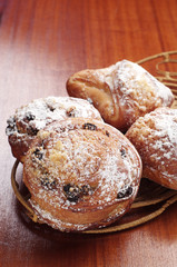 Buns with raisins and apples