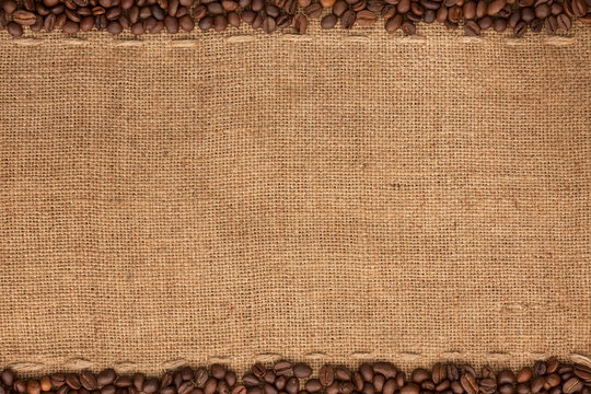 Coffee beans lying on sackcloth