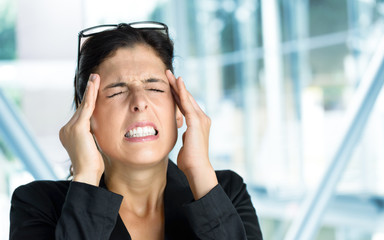 Business woman headache and stress
